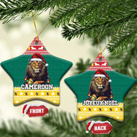 Green ceramic star-shaped Christmas ornaments with lion in Santa hat, gold hanging loops.