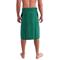 Green lavalava wrap skirt, back view with geometric pattern and drawstring hem