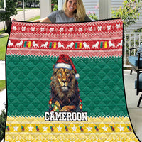 Green Christmas quilt with lion wearing a Santa hat and “CAMEROON” text panel