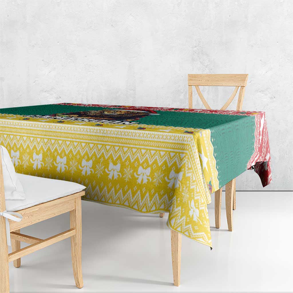 Rectangular Christmas tablecloth with green center panel and yellow geometric pattern