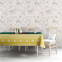 Long Christmas tablecloth with yellow damask pattern and green stripe across the top