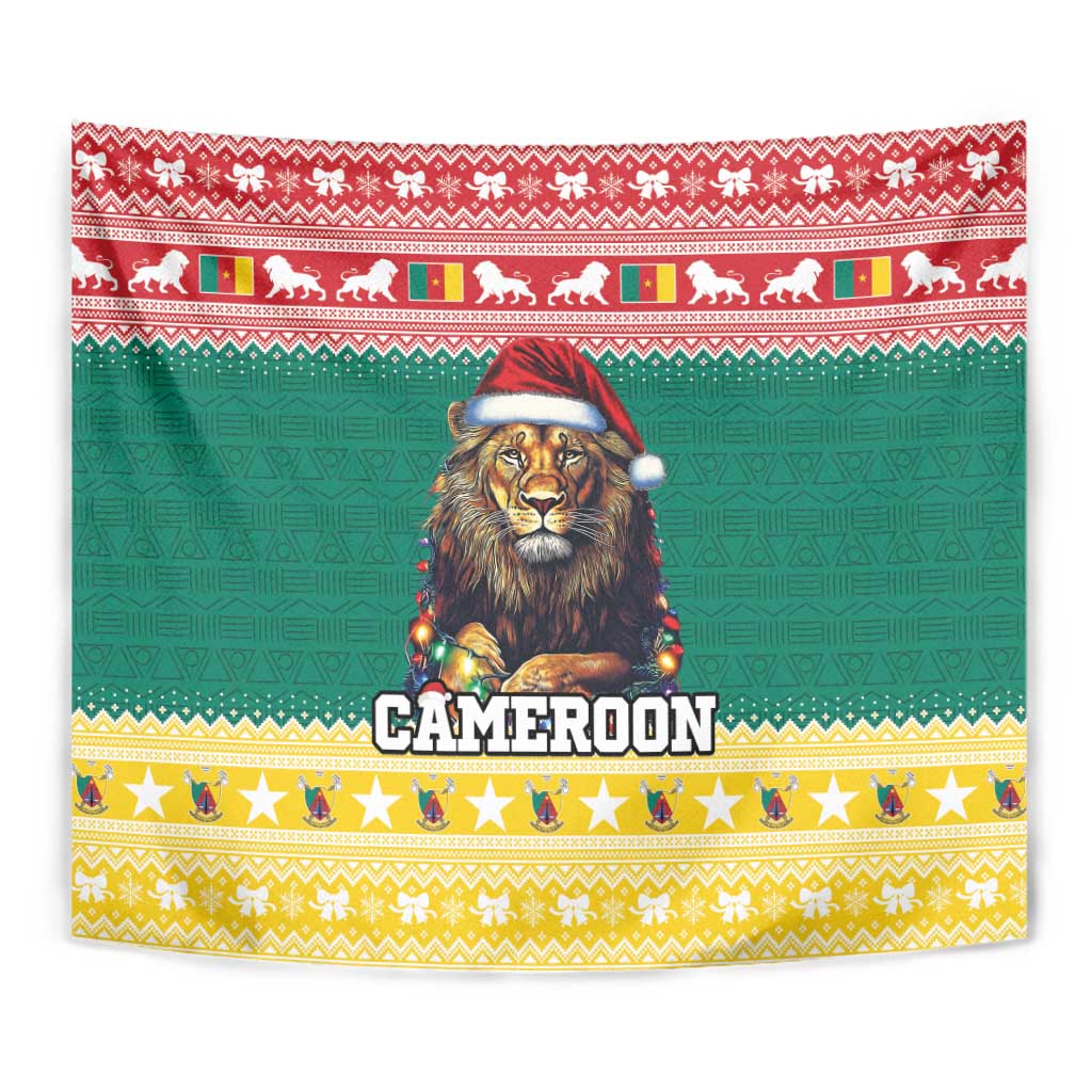 Green Christmas tapestry with central lion in red Santa hat and Cameroon lettering