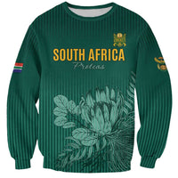 Green unisex cricket sweatshirt with crew neck, South Africa Proteas front print and floral emblem