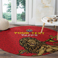 Red round rug featuring lion head and 'YOUR TEXT' lettering