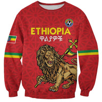 Red Ethiopia football sweatshirt with lion graphic, striped accents, crew neck cuffs