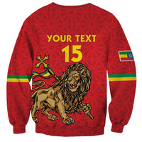 Red football sweatshirt back with lion, star, YOUR TEXT and 15, striped cuffs