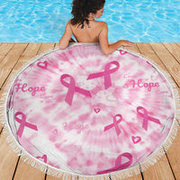 Round pink breast cancer awareness blanket with pink ribbon print and tassel fringe