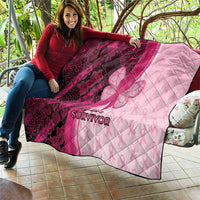 Pink and dark maroon survivor quilt with quilted diamonds, ribbon-butterfly artwork, and text