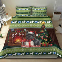 Christmas bedding set on bed: terrier graphic, decorated tree and green patterned borders