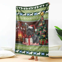 Green Christmas blanket with Scottish terrier portrait, holiday tree, gifts and snowflake border.