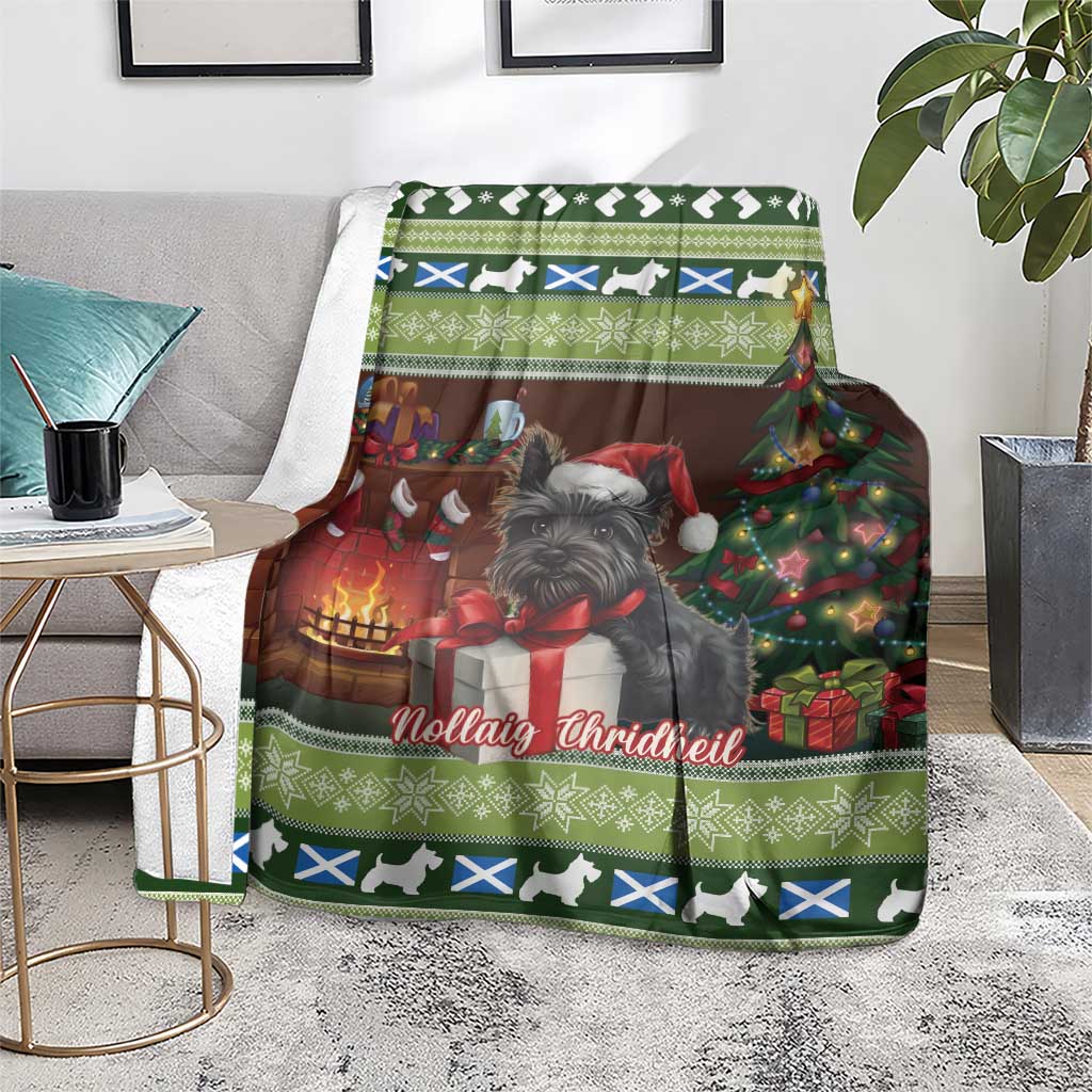 Green Christmas throw blanket with Scottish terrier, lit fireplace, tree, gifts and tartan-style trim.