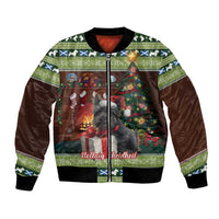 Brown zip-up bomber jacket with green patterned bands and terrier Christmas scene on front