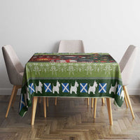 Christmas tablecloth on dining table with green border and white terrier silhouettes