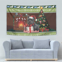 Christmas tapestry showing gray Scottish terrier in red outfit, tree lights, and festive patterns