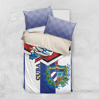 Cuba-themed bedding set with blue-and-white striped pillowcases and bird-and-coat-of-arms duvet