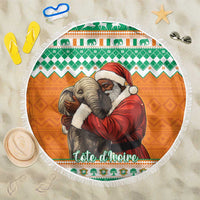 Round beach blanket with Santa holding gray elephant, green and orange patterned border