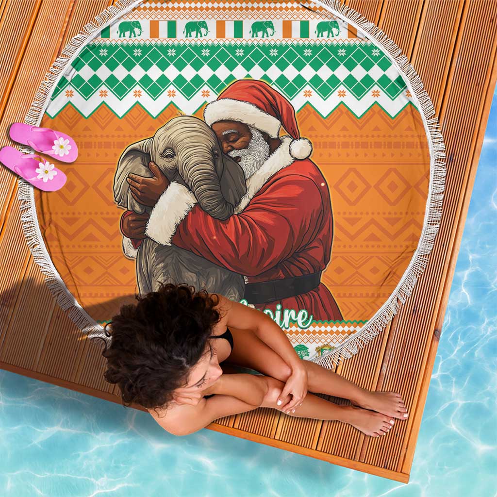 Round Christmas beach blanket with fringe, Santa holding a gray elephant on orange fabric