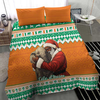 Christmas bedding set duvet close-up with orange and green patterns and elephant-Santa embrace