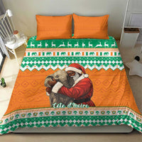 Christmas bedding set on bed: orange and green elephant-Santa hug duvet with two orange pillows