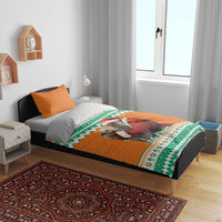 Christmas bedding set with orange and green pattern, featuring elephant hugging Santa on duvet