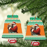 Bell-shaped ceramic Christmas ornaments, orange and green Santa hugging elephant design