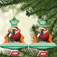 Bell-shaped ceramic Christmas ornament pair, green top with Santa hugging elephant art