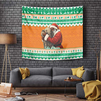 Christmas wall tapestry with Santa hugging elephants, green and orange festive border.