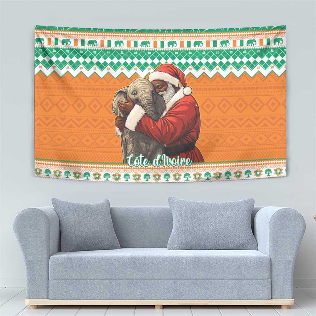 Wall Christmas tapestry with Santa hugging elephants, green-and-white patterned edges.