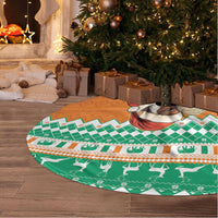 Round Christmas tree skirt, green plaid and orange border with elephant Santa artwork