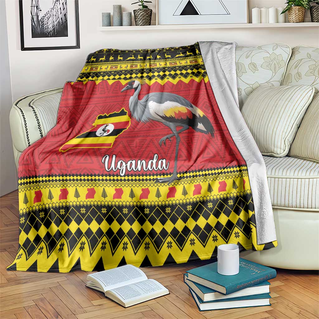 Crowned crane blanket draped on sofa, red yellow black Uganda flag map artwork