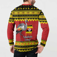 Red and black patterned button-up sweatshirt with crane and Uganda flag map on back
