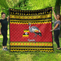 Uganda flag quilt with red base, crowned crane graphic, black-and-yellow border pattern