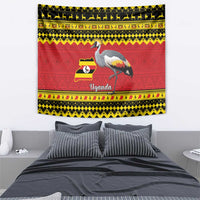 Red wall tapestry featuring crowned crane and Uganda flag map, framed by yellow patterned border