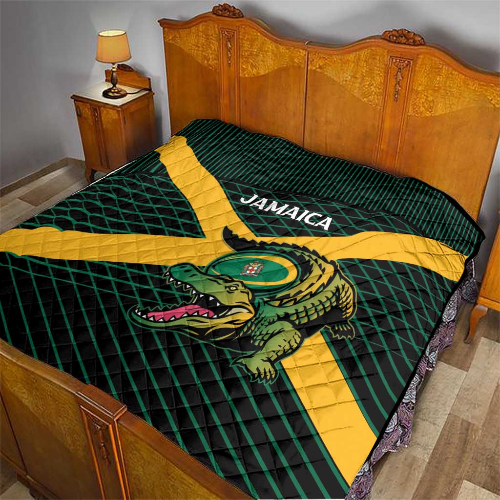 Rugby-themed quilt spread on bed, green plaid background with yellow diagonal cross