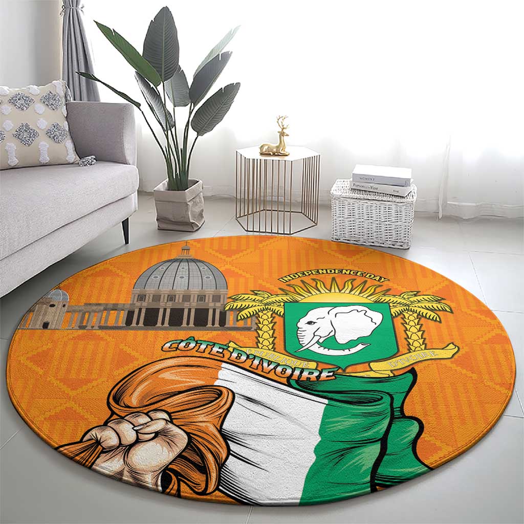 Round orange carpet with large coat of arms emblem and raised lettering
