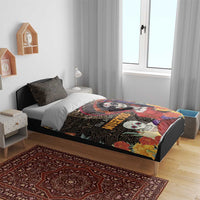 Day of the Dead bedding set on single bed, black and floral skull portrait duvet