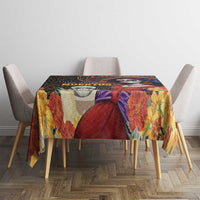 Tablecloth featuring skull illustration, red roses, purple accents, and yellow flowers