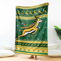 Green Springbok rugby Christmas blanket hanging display with gold-and-yellow patterned border