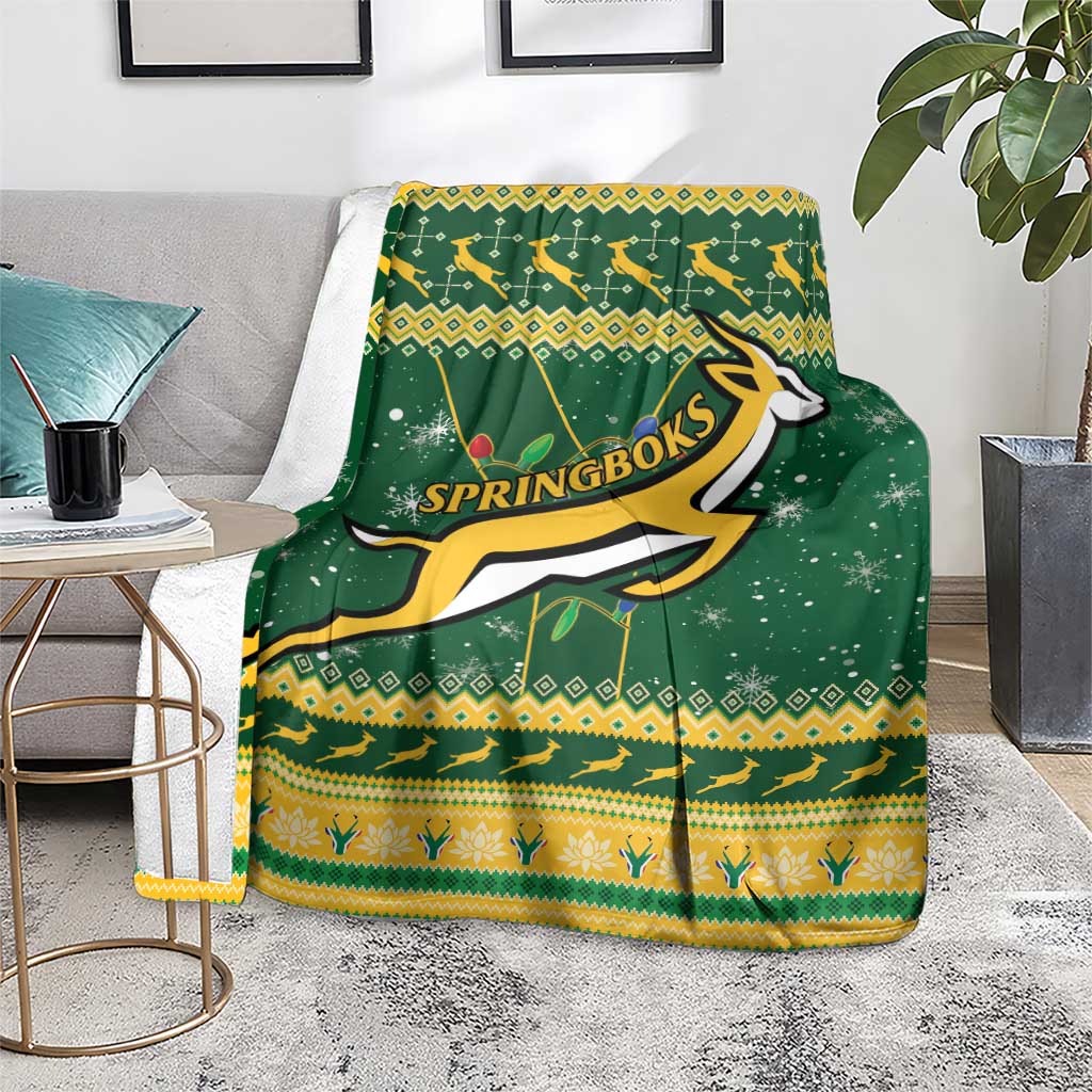 Green and yellow Springbok rugby Christmas blanket covering seat with centered logo artwork