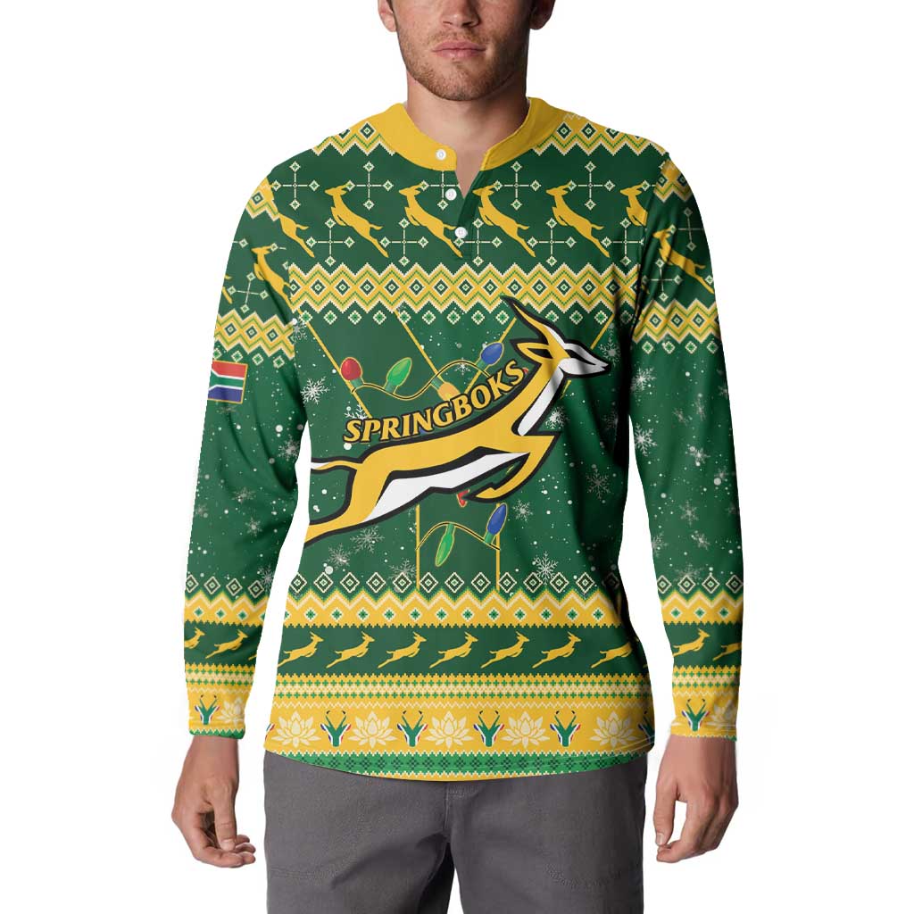 Christmas rugby button sweatshirt on model, green long sleeves with front print
