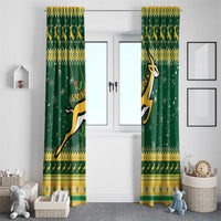 Festive dark green door curtain panels with yellow patterned band and Springboks rugby emblem