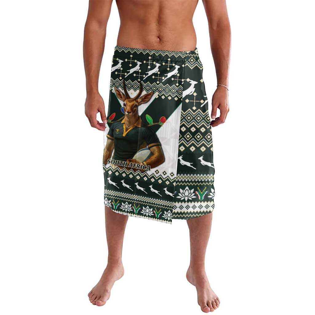 Lavalava wrap skirt with dark green animal and geometric Christmas pattern, South Africa text