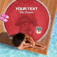 Red round beach blanket with tassel fringe, 'Your Text The Pirates' and soccer badge.