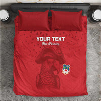 Red pirate-themed bedding set with matching pillows, parrot graphic and crest emblem