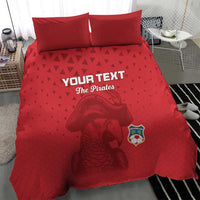 Red pirate-themed comforter cover and pillows with parrot illustration and crest logo