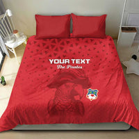 Red pirate-themed bedding set featuring parrot portrait graphic and shield crest on duvet