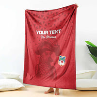 Red football blanket with 'YOUR TEXT' and 'The Pirates' graphic, standing fully opened