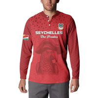 Red button-front long-sleeve sweatshirt with Seychelles Pirates front print, model wearing