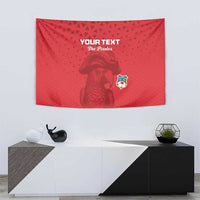 Red custom football tapestry featuring pirate character graphic and football crest, wall-hung.