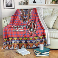 Red and blue plaid shuka blanket with black-and-white embroidered beadwork panel and border
